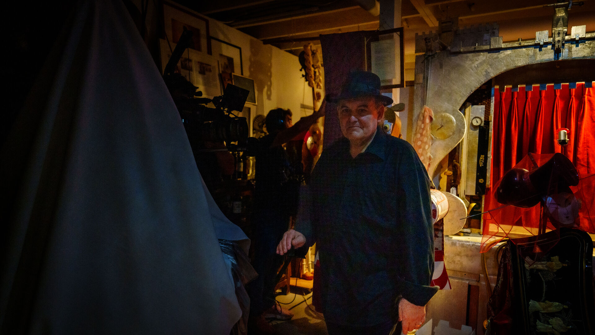 Filmmaker and subject in deep conversation on set